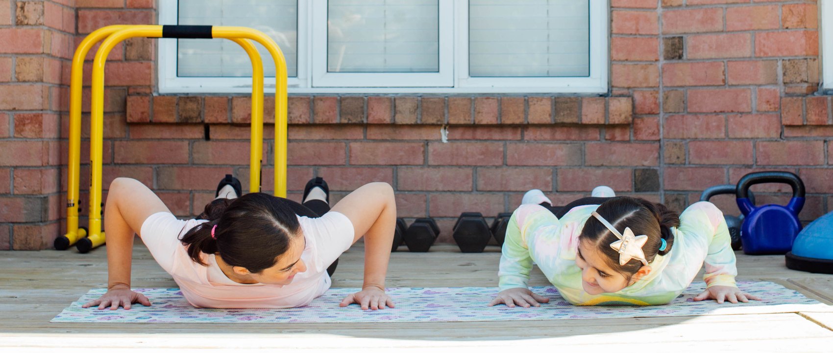 Salwa Qadir training outdoors with her daughter